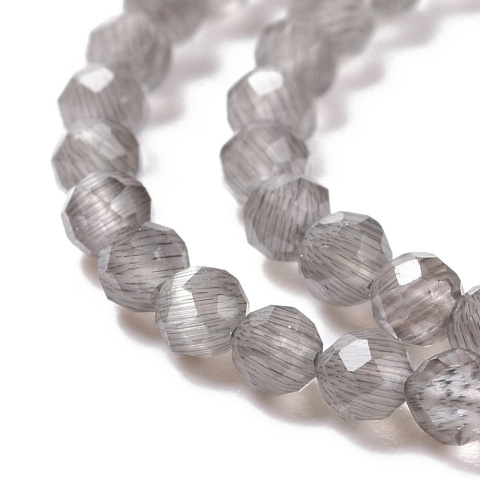 Faceted glass cat's eye 3 mm strand grey Faceted glass cat's eye 3 mm strand grey