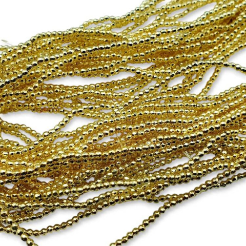 Bright gold hematite faceted ball 2 mm cord Bright gold hematite faceted ball 2 mm cord