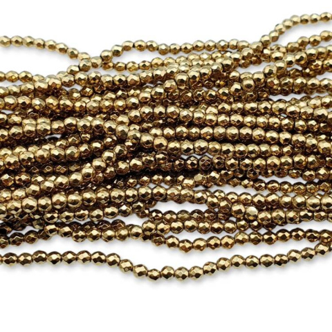 Gold hematite faceted ball 4 mm cord Gold hematite faceted ball 4 mm cord