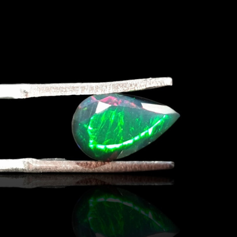 Black Ethiopian opal faceted 10x6 mm no 665 Black Ethiopian opal faceted 10x6 mm no 665