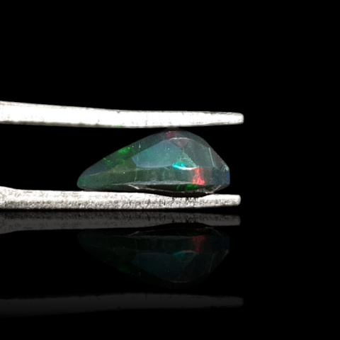 Black Ethiopian opal faceted 10x6 mm no 665 Black Ethiopian opal faceted 10x6 mm no 665