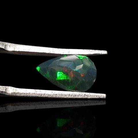 Black Ethiopian opal faceted 10x6 mm no 665 Black Ethiopian opal faceted 10x6 mm no 665