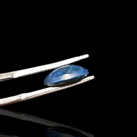 Black Ethiopian opal faceted 10x7 mm no 654 Black Ethiopian opal faceted 10x7 mm no 654