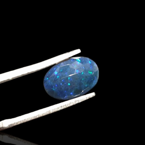 Black Ethiopian opal faceted 10x7 mm no 654 Black Ethiopian opal faceted 10x7 mm no 654