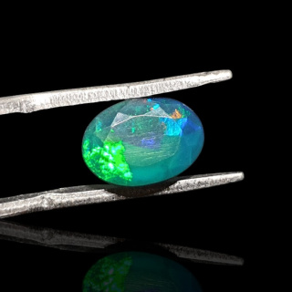 Black Ethiopian opal faceted 10x7 mm no. 657