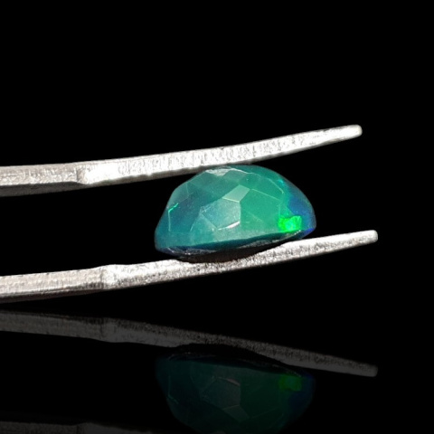 Black Ethiopian opal faceted 10x7 mm no. 657 Black Ethiopian opal faceted 10x7 mm no. 657