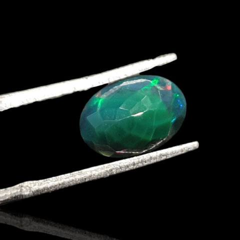Black Ethiopian opal faceted 10x7 mm no. 657 Black Ethiopian opal faceted 10x7 mm no. 657