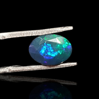 Black Ethiopian opal faceted 10x7 mm no. 658
