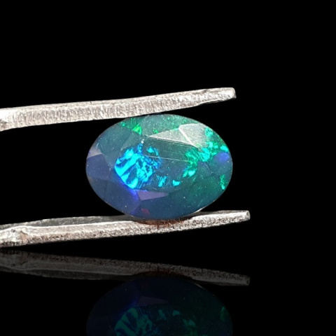 Black Ethiopian opal faceted 10x7 mm no 658 Black Ethiopian opal faceted 10x7 mm no 658