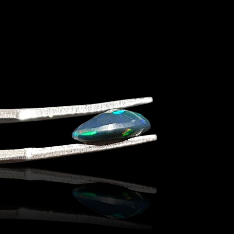 Black Ethiopian opal faceted 10x7 mm no 658 Black Ethiopian opal faceted 10x7 mm no 658