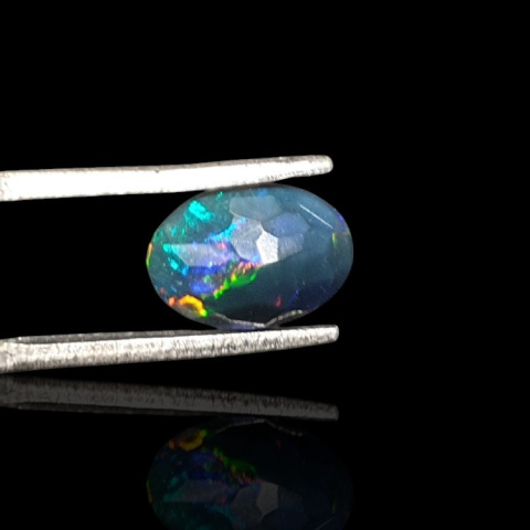 Black Ethiopian opal faceted 10x7 mm no 658 Black Ethiopian opal faceted 10x7 mm no 658