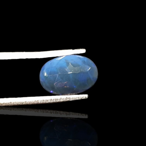 Black Ethiopian opal faceted 10x7 mm no. 663 Black Ethiopian opal faceted 10x7 mm no. 663