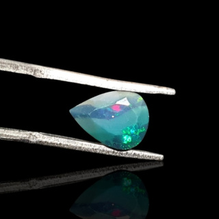 Black Ethiopian opal faceted 10x7 mm no. 664