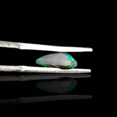 Black Ethiopian opal faceted 10x7 mm no. 664 Black Ethiopian opal faceted 10x7 mm no. 664