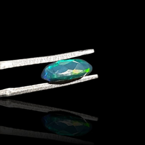 Black Ethiopian opal faceted 10x7 mm no. 669 Black Ethiopian opal faceted 10x7 mm no. 669