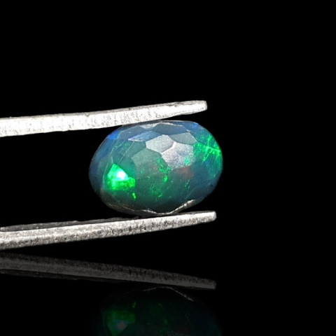 Black Ethiopian opal faceted 10x7 mm no. 669 Black Ethiopian opal faceted 10x7 mm no. 669