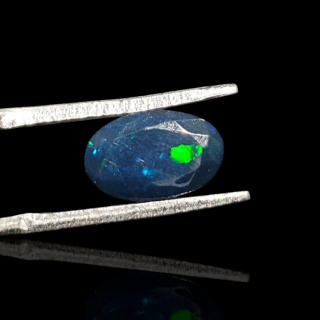 Black Ethiopian opal faceted 10x7 mm no. 676