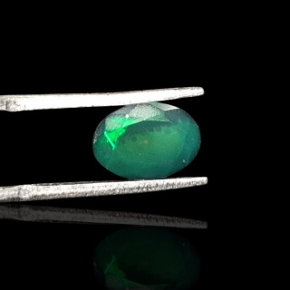 Black Ethiopian opal faceted 10x7 mm no. 682