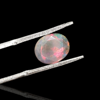 Black Ethiopian opal faceted 10x8 mm no. 661
