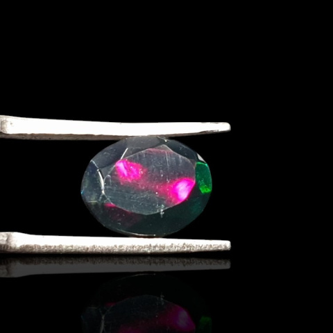 Black Ethiopian opal faceted 10x8 mm no. 662 Black Ethiopian opal faceted 10x8 mm no. 662