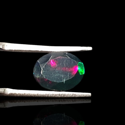 Black Ethiopian opal faceted 10x8 mm no. 662 Black Ethiopian opal faceted 10x8 mm no. 662