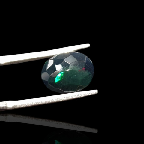 Black Ethiopian opal faceted 10x8 mm no. 662 Black Ethiopian opal faceted 10x8 mm no. 662