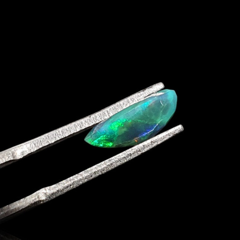 Black Ethiopian opal faceted 11x6 mm no 667 Black Ethiopian opal faceted 11x6 mm no 667