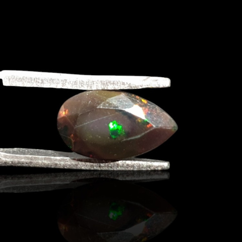 Black Ethiopian opal faceted 11x6 mm no. 674 Black Ethiopian opal faceted 11x6 mm no. 674