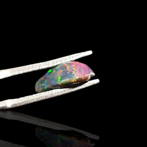 Black Ethiopian opal faceted 11x7 mm no 648 Black Ethiopian opal faceted 11x7 mm no 648