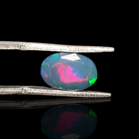 Black Ethiopian opal faceted 11x7 mm no 652 Black Ethiopian opal faceted 11x7 mm no 652