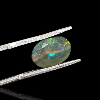 Black Ethiopian opal faceted 11x7 mm no. 653