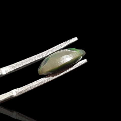 Black Ethiopian opal faceted 11x7 mm no 653 Black Ethiopian opal faceted 11x7 mm no 653