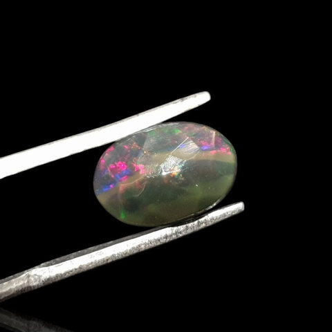 Black Ethiopian opal faceted 11x7 mm no 653 Black Ethiopian opal faceted 11x7 mm no 653