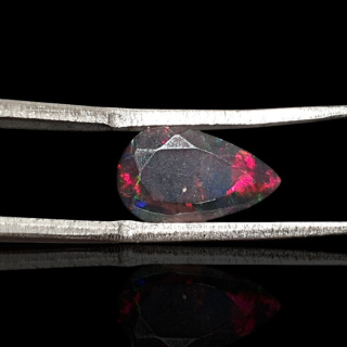 Black Ethiopian opal faceted 11x7 mm no. 656