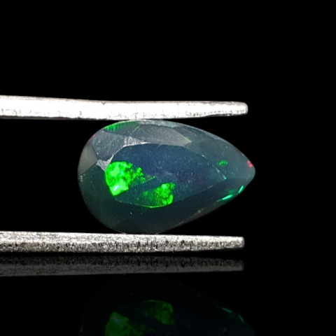 Black Ethiopian opal faceted 11x7 mm no. 668 Black Ethiopian opal faceted 11x7 mm no. 668