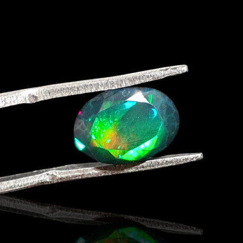 Black Ethiopian opal faceted 11x8 mm no. 634 Black Ethiopian opal faceted 11x8 mm no. 634
