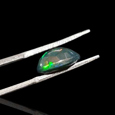 Black Ethiopian opal faceted 11x8 mm no. 634 Black Ethiopian opal faceted 11x8 mm no. 634