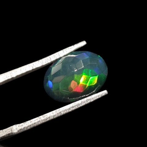 Black Ethiopian opal faceted 11x8 mm no. 634 Black Ethiopian opal faceted 11x8 mm no. 634