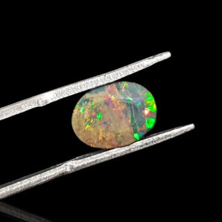 Black Ethiopian opal faceted 11x8 mm no 636