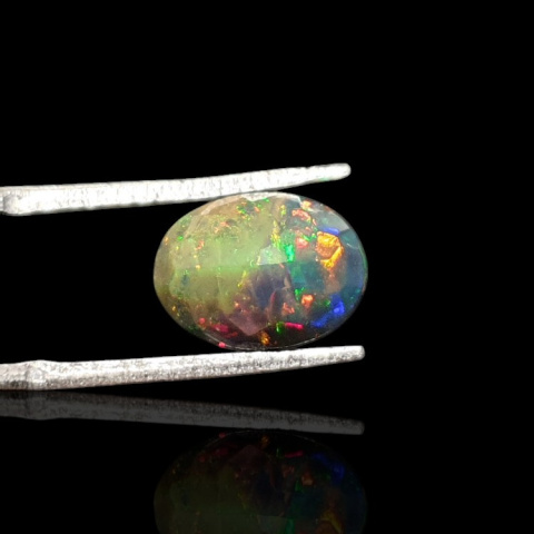 Black Ethiopian opal faceted 11x8 mm no 636 Black Ethiopian opal faceted 11x8 mm no 636