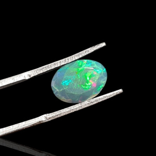 Black Ethiopian opal faceted 11x8 mm no 640