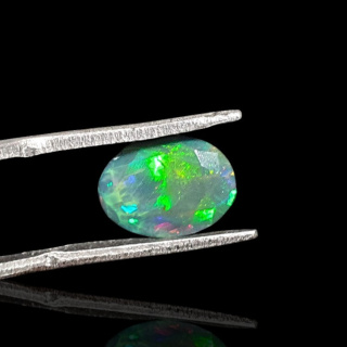 Black Ethiopian opal faceted 11x8 mm no 640