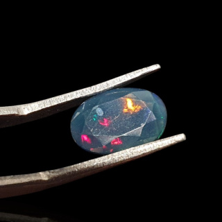 Black Ethiopian opal faceted 11x8 mm no 643