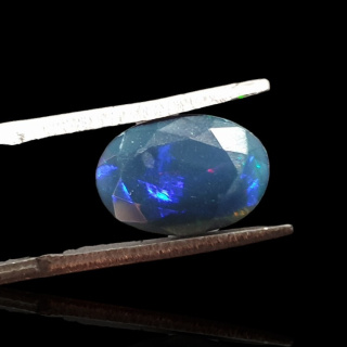Black Ethiopian opal faceted 11x8 mm no 643