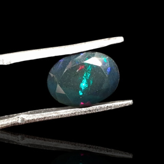 Black Ethiopian opal faceted 11x8 mm no 646