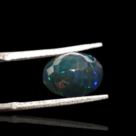 Black Ethiopian opal faceted 11x8 mm no 646 Black Ethiopian opal faceted 11x8 mm no 646