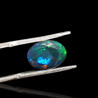 Black Ethiopian opal faceted 11x8 mm no 650
