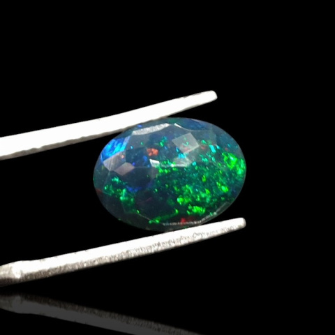 Black Ethiopian opal faceted 11x8 mm no 650 Black Ethiopian opal faceted 11x8 mm no 650