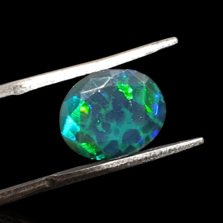 Black Ethiopian opal faceted 11x9 mm no. 635