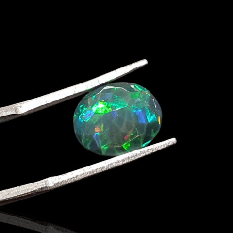 Black Ethiopian opal faceted 11x9 mm no. 635 Black Ethiopian opal faceted 11x9 mm no. 635
